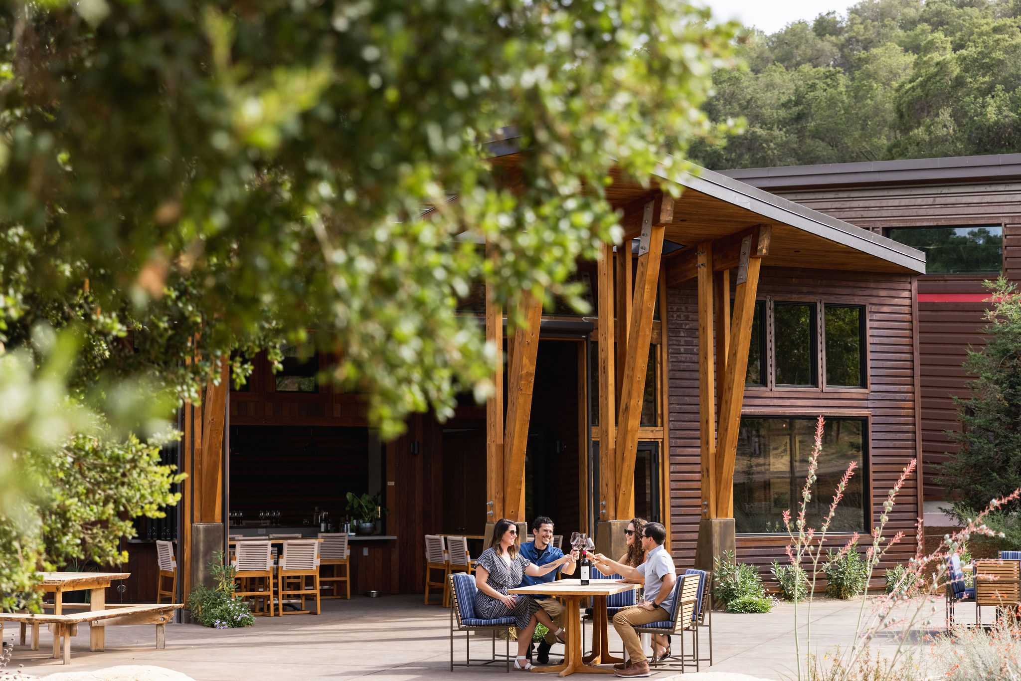 entryway of tasting room with people sitting outside